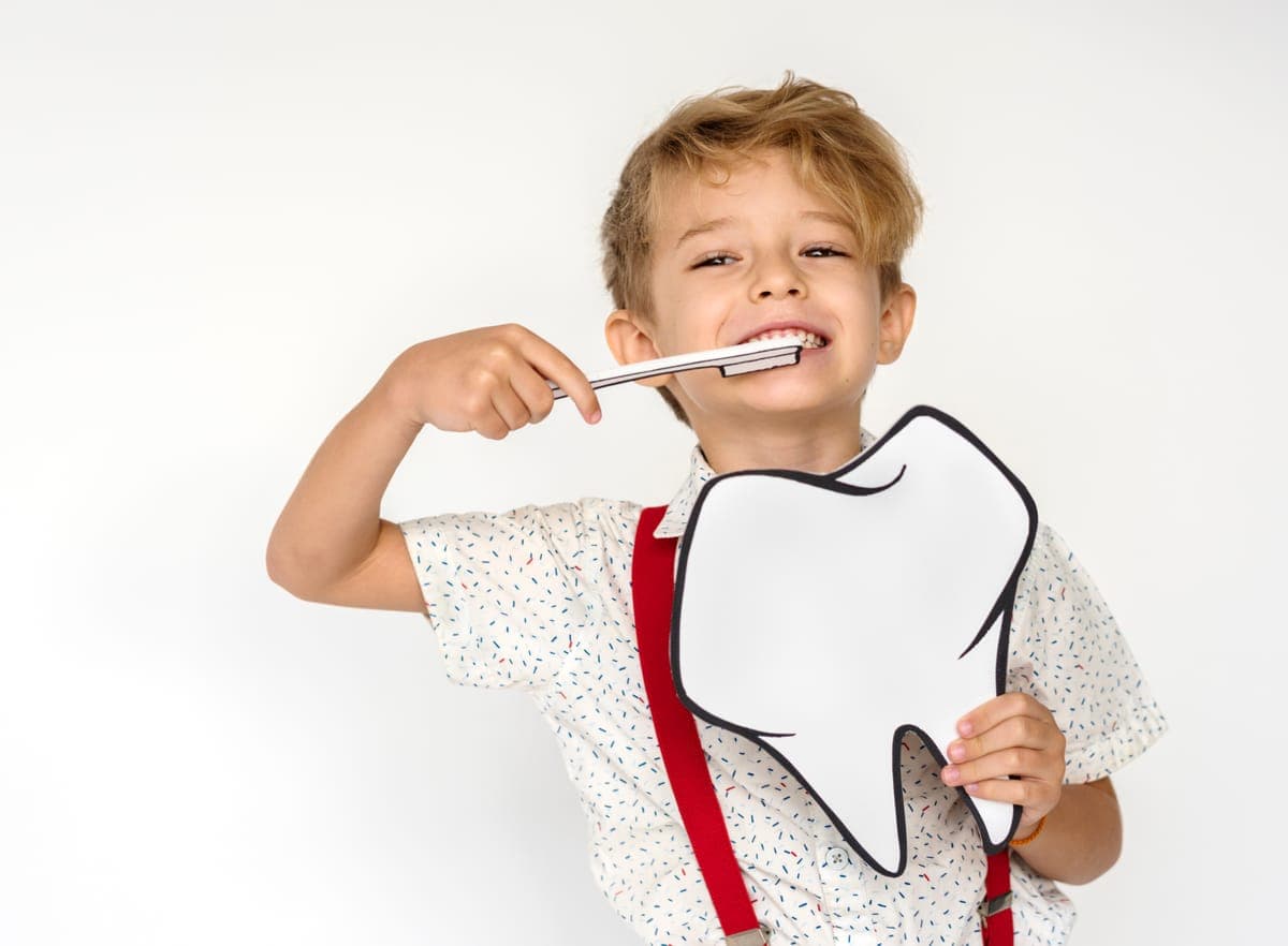 Quando levar as crianças ao dentista pela primeira vez
